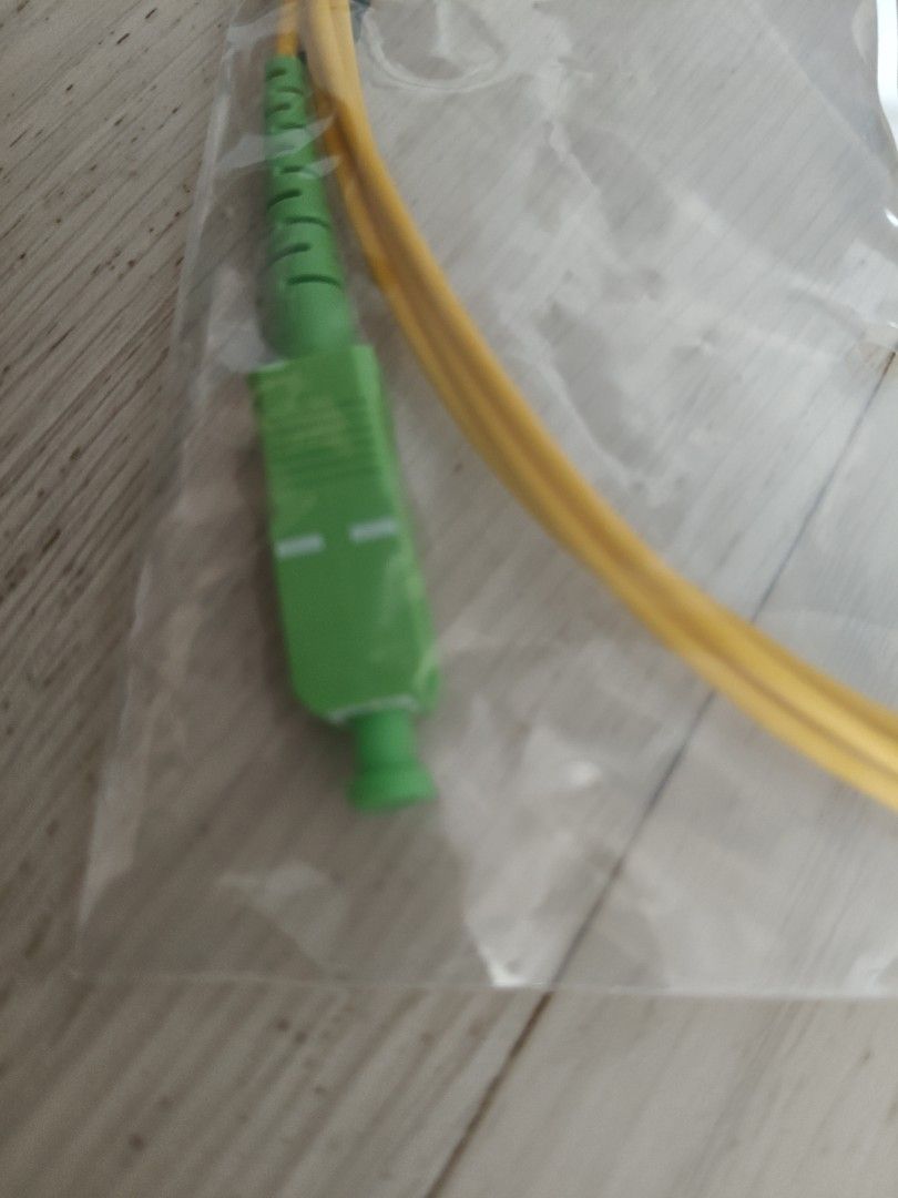 Fiber optic patch cord (Category: Networking) located in Singapore. Submitted by andrewangsg (Listing ID 1414896367, Image 3). Description: Link-All fiber optic patch cord, a type of cable capped at both ends with connectors, used to link telecommunication equipment. Connector Type: SC/APC on both ends. Fiber Mode: Single-mode (SM/G657A2). Cable Diameter: 2.0mm. Jacket Material: Low Smoke Zero Halogen (LSZH). Length: 2 meters..
