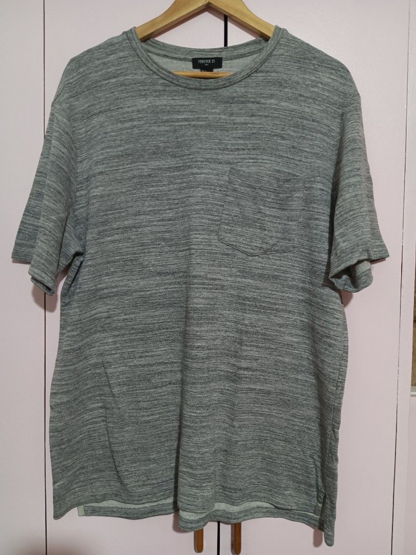 Forever 21 Grey Oversized Shirt (Category: Dresses) located in Quezon City. Submitted by whimscaprices (Listing ID 1414992239, Image 2). Description: LOWERING ALL THE PRICES OF MY SALE ITEMS. Major decluttering, moving to a new home. Please adopt our beloved stuff. If you are thinking of an offer, kindly message me, might as well I can consider it, but not too low ball since you can see that all of the items posted here are personally owned and t