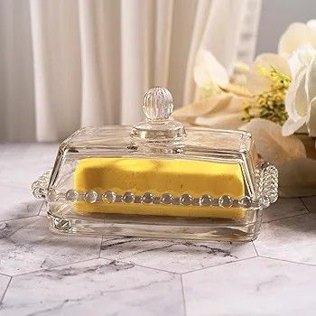 Glass Butter Dish with Handle (Category: Other Kitchenware & Tableware) located in Manila. Submitted by zestawang (Listing ID 1414852470, Image 2). Description: - Elegant glass butter dish - withhandle - Rectangular shape - Beaded base design - Clear glass for easy viewing - Perfect for serving butter - Keeps butter fresh.