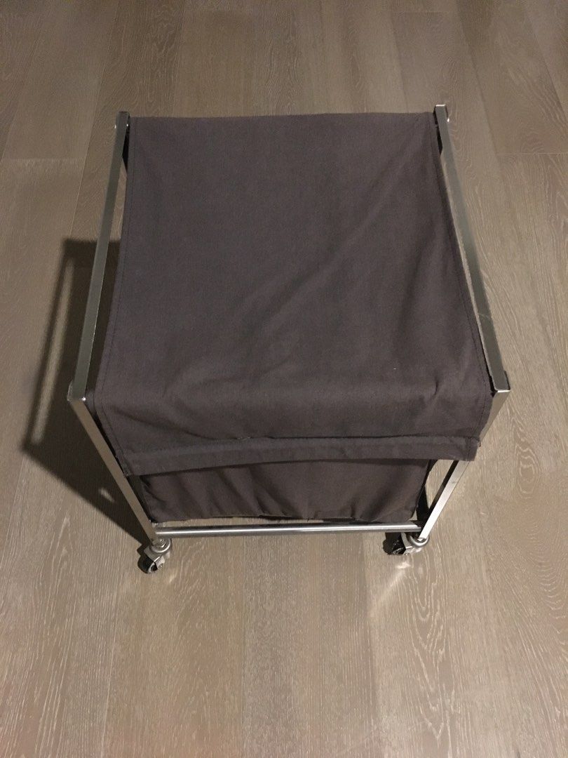 IKEA Grundtal laundry bin or clothes hamper (2 pieces) (Category: Other Home Furniture) located in Makati City. Submitted by savedeal (Listing ID 1414863770, Image 2). Description: Cotton laundry hampers on lightweight stainless steel frame and caster wheels. Use for storing and sorting clothes for laundry. Two pieces. Cloth can be removed to wash. Dimensions Length: 41 cm Width: 41 cm Height: 51 cm Volume: 65 L RFS: decluttering. .