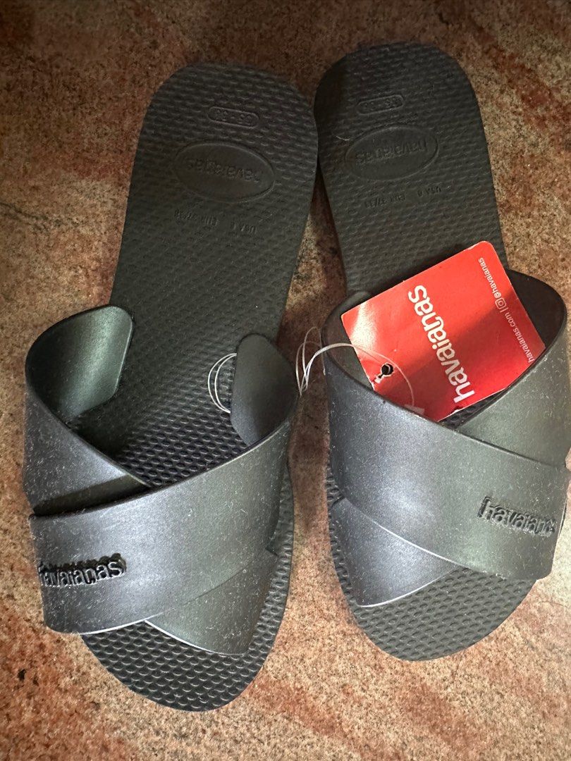 Havaianas Women's Slide Sandals - Brand New (Category: Sandals) located in Singapore. Submitted by mariatunphyu (Listing ID 1414844304, Image 1). Description: - Brand new Havaianas slide sandals - Size: 35/36 - Color: Black - Condition: Brand new with original tag - Great for everyday wear - can send thru smart pac with additional cost - not liable for any lost.