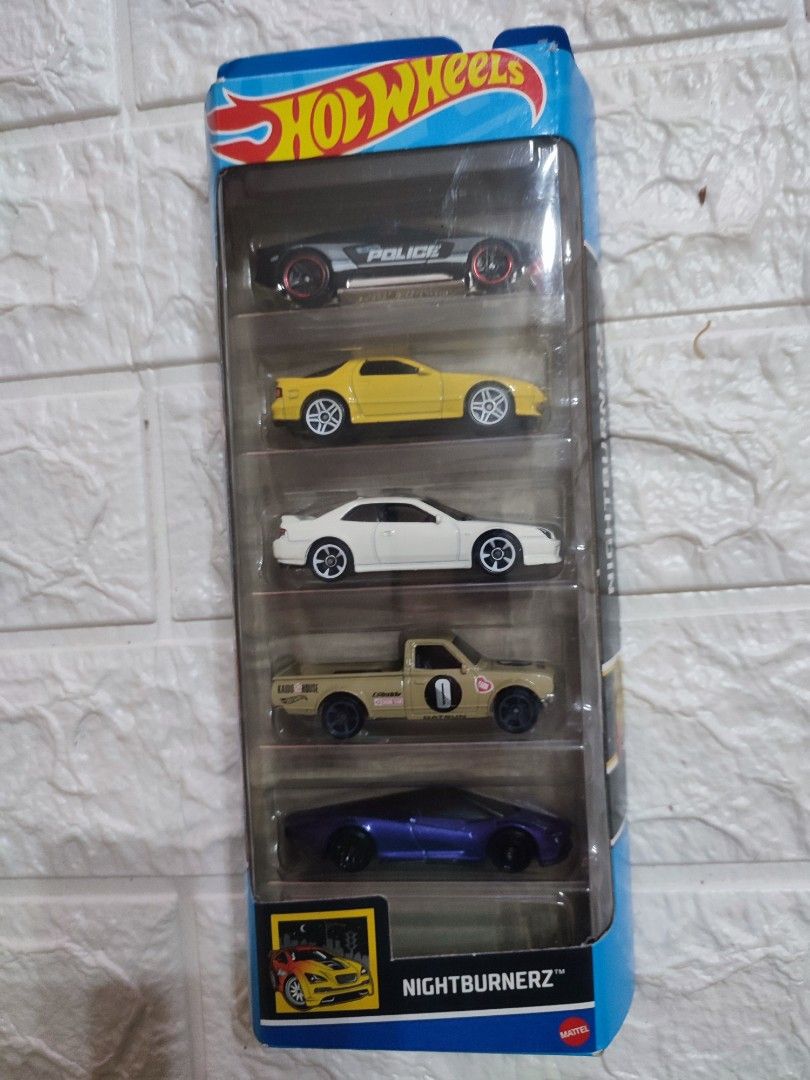 Hot Wheels Nightburnerz 5-Car Pack (Category: Vehicle & Diecast Models) located in Narvacan. Submitted by jigger85 (Listing ID 1414946044, Image 1). Description: - Hot Wheels Nightburnerz 5-car pack - Includes: - Alpha Pursuit - '99 Mazda Savanna RX-7 FC3S - '98 Honda Prelude - Datsun 620 - McLaren Speedtail - All cars are in their original packaging. - Perfect for collectors and kids..