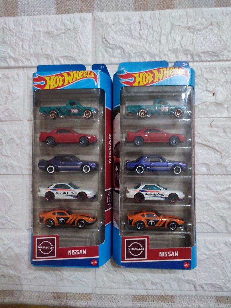 Hot Wheels Nissan 5-Car Set (Category: Vehicle & Diecast Models) located in Narvacan. Submitted by jigger85 (Listing ID 1414950027, Image 1). Description: - Hot Wheels Nissan Diecast Set - Includes: - Datsun 620 - Nissan Fairlady Z - Nissan Silvia (S15) - Nissan Skyline GT-R (BNR32) - Nissan Skyline HT 2000GT-R - All cars are in original packaging. - Great for Hot Wheels and Nissan car collectors..