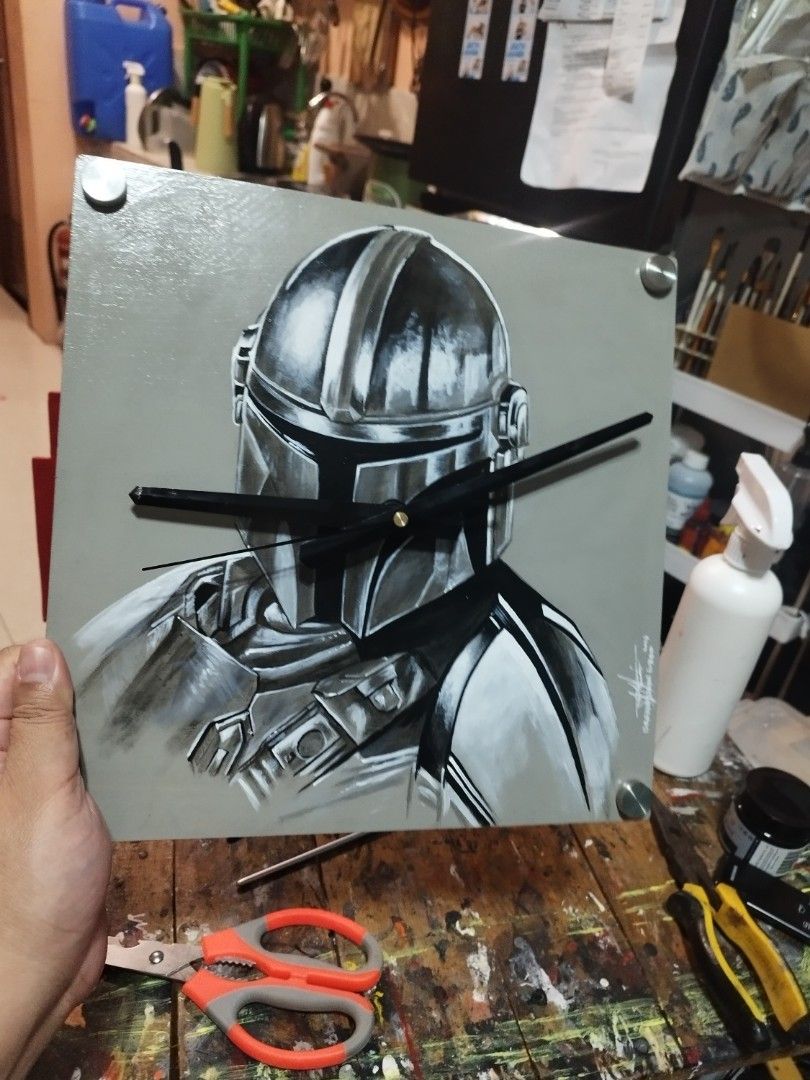 mandalorian DIY wall clock star wars (Category: Wall Decor) located in Bacoor. Submitted by bigdaddy1027 (Listing ID 1415033605, Image 1). Description: DIY custom Hand Painted artwork on wood Wall clock 12x12 inches.
