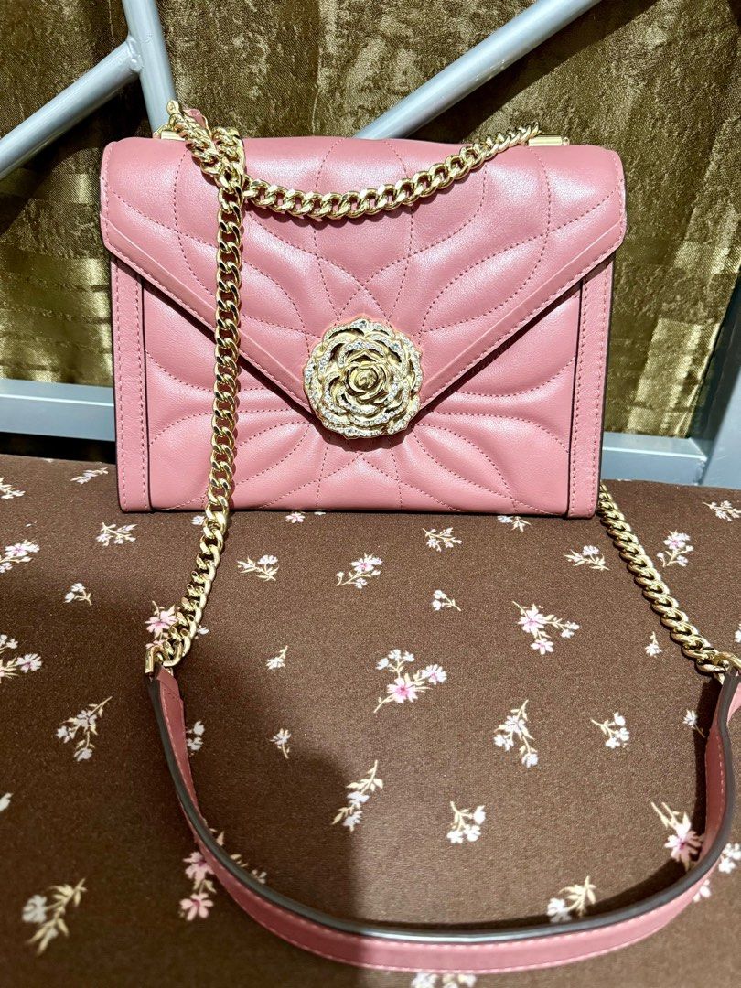 Michael Kors Whitney Large Petal Quilted (Category: Luxury Bags & Wallets) located in General Trias. Submitted by senorita_0528 (Listing ID 1414898874, Image 2). Description: Preloved Michael Kors Whitney Large Petal Quilted Leather Quilted design with rose embellishment Rose-hued color Chain strap and flap closure Interior zippered pocket Includes care card Bought in US Condition: Like new (used once) ₱4,500.