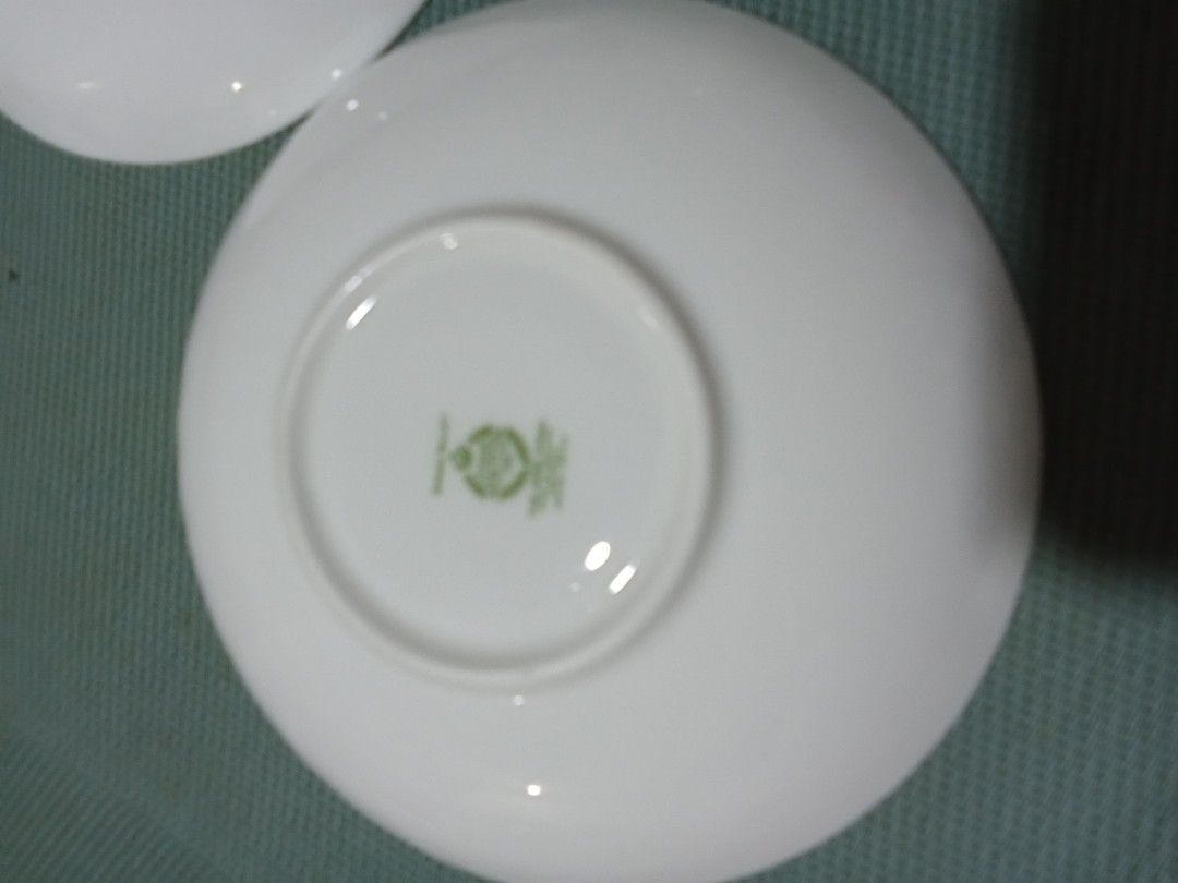 2 pcs Minton Floral Saucer Set (Category: Coffee & Tea Tableware) located in Tagaytay City. Submitted by vianang (Listing ID 1414853807, Image 2). Description: - Set of 2 saucers - Delicate floral pattern - White base with colorful flower designs - Green logo on the underside - Perfect for tea or coffee - Adds a charming touch to your table setting.