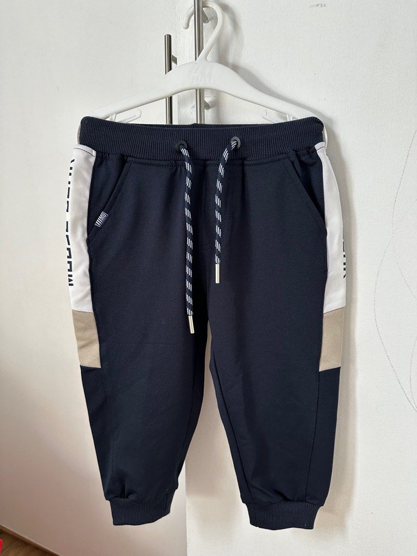 Moose Gear Kids' Tracksuit Set (Category: Babies & Kids Fashion) located in San Fernando. Submitted by reynQ (Listing ID 1414867925, Image 3). Description: Used once Size: M - Moose Gear kids' tracksuit set - Includes navy blue zip-up hoodie and matching pants - Hoodie features: - Color block design - Moose Gear brand name on chest - Pants feature: - Elastic waistband with drawstring - Side pockets.