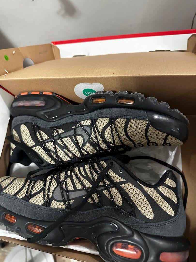 Nike Air Max Plus TN Black/Orange (Category: Sneakers) located in Imus. Submitted by jrbtorio (Listing ID 1414966769, Image 1). Description: - Nike Air Max Plus TN sneakers - Color: Black and Orange - Mesh upper with distinctive cage design - Iconic visible Air Max unit - Comes with original box - Black laces and sole with orange accents.