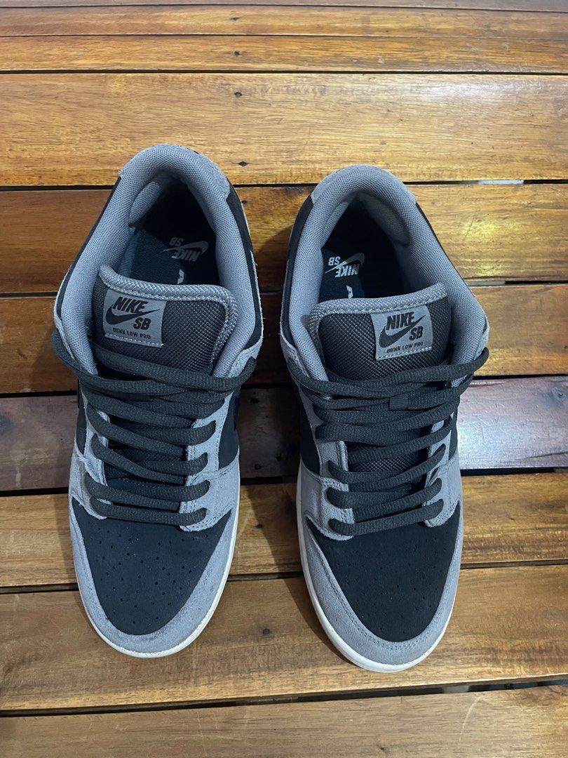 Nike SB Dunk Low Black Grey (Category: Sneakers) located in Manila. Submitted by kad0318 (Listing ID 1414849797, Image 2). Description: - Nike SB Dunk Low - Black and grey colorway - Suede upper - Black swoosh - White midsole - Gum-colored outsole - Nike SB logo on tongue - Minimal sole wear.