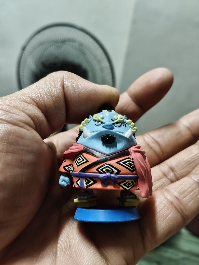 One Piece Jinbe Figure badai digimon (Category: Figurines & Statues) located in Manila. Submitted by namaste888 (Listing ID 1414971603, Image 1). Description: - One Piece Jinbe figure. - Features Jinbe in his iconic attire. - Stands on a blue base. - Well-detailed with vibrant colors. - Intricate design. - Base includes copyright information. - A must-have collectible for One Piece fans..