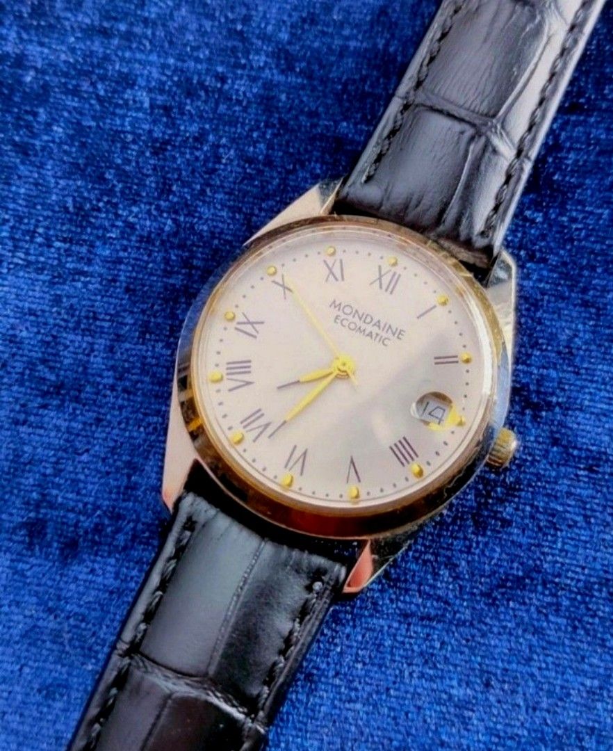 Original Mondaine Ecomatic Vintage (Category: Luxury Watches) located in San Juan City. Submitted by exclusivelyours (Listing ID 1414974120, Image 2). Description: A rare vintage find from the Swiss brand Mondaine, best known for their official Swiss Railways clocks. ​Movement: Automatic (Self-winding mechanical movement). Likely an ETA or similar Swiss caliber. It winds itself with the movement of your wrist and does not require a battery. ​Case