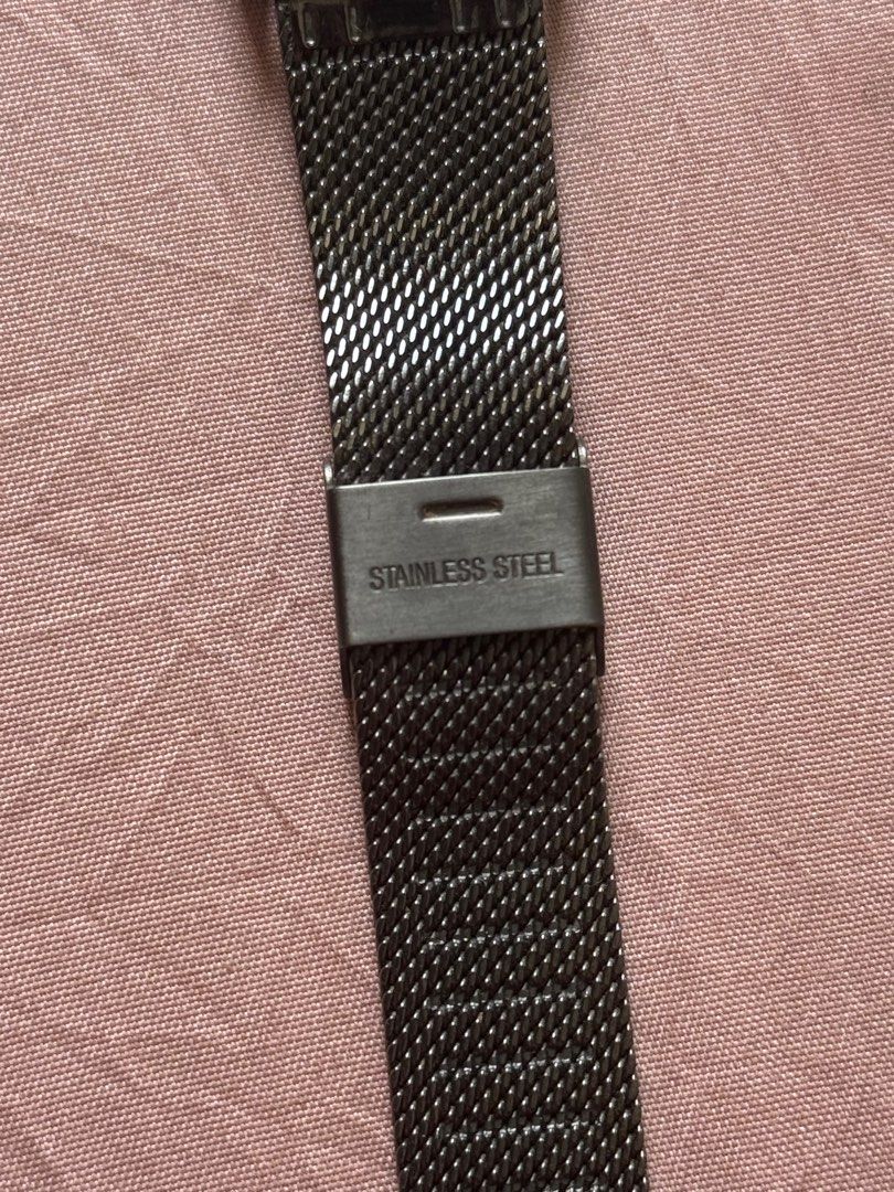 Parfois Stainless Steel Mesh Watch (Category: Women's Watches) located in Manila. Submitted by gelds (Listing ID 1414846355, Image 3). Description: - Stylish Parfois watch - Sleek dark grey face - Stainless steel mesh band - Features a small seconds subdial - "Stainless Steel" band marking - Parfois brand markings on the back - No box.