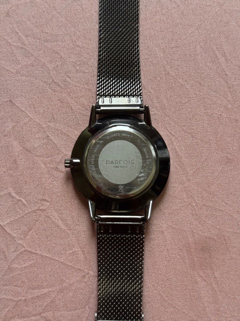 Parfois Stainless Steel Mesh Watch (Category: Women's Watches) located in Manila. Submitted by gelds (Listing ID 1414846355, Image 2). Description: - Stylish Parfois watch - Sleek dark grey face - Stainless steel mesh band - Features a small seconds subdial - "Stainless Steel" band marking - Parfois brand markings on the back - No box.