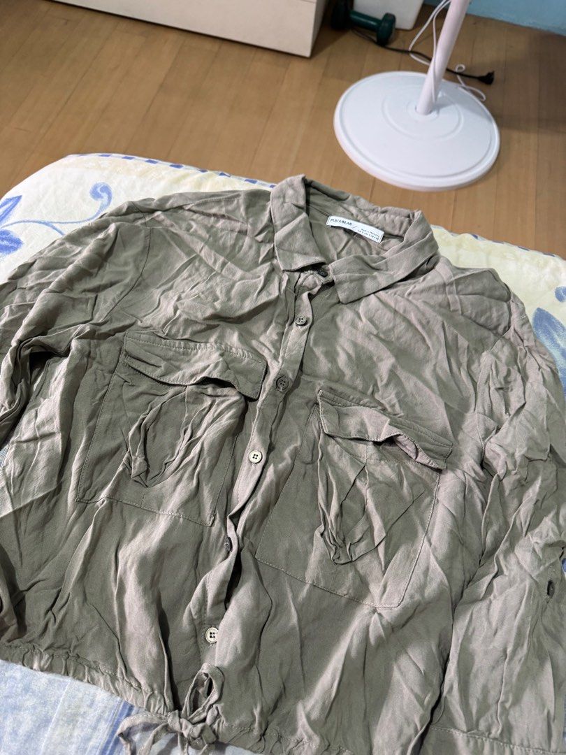 Pull&Bear Longsleeve Top (Category: Shirts) located in Caloocan City. Submitted by daybysunlight (Listing ID 1414894160, Image 1). Description: ♡ can be used as an outerwear or the top itself ♡ size: EUR S / USA S / MEX 26 ♡ neutral color ♡ collared neckline ♡ button-down closure ♡ two front pockets ♡ tie detail at waist ♡ good quality; breathable and comfy ♡ made in morocco ♡ does not fit me anymore.