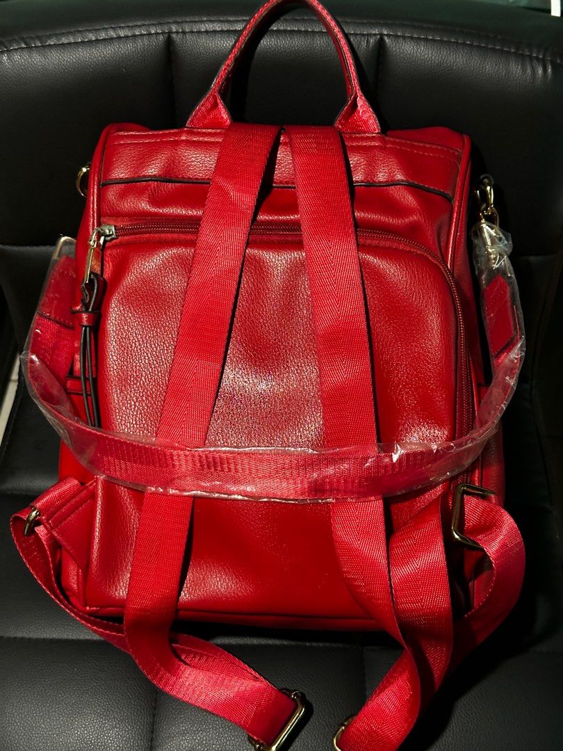 Red Convertible Backpack (Category: Backpacks) located in Dagupan City. Submitted by fonsomatthy (Listing ID 1414847262, Image 2). Description: ‼️FOR SALE‼️ ✅ Cheruty Women Backpack Purse PU Leather Anti-theft Casual Backpack - Can be worn as a backpack or carried as a handbag - Front zippered pocket - Top handle - Patterned interior lining - Multiple compartments - Adjustable straps - Gold-toned hardware 👉🏻 No major signs of use; used only thr