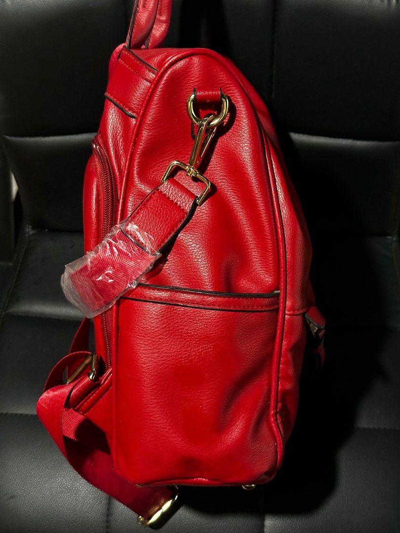 Red Convertible Backpack (Category: Backpacks) located in Dagupan City. Submitted by fonsomatthy (Listing ID 1414847262, Image 3). Description: ‼️FOR SALE‼️ ✅ Cheruty Women Backpack Purse PU Leather Anti-theft Casual Backpack - Can be worn as a backpack or carried as a handbag - Front zippered pocket - Top handle - Patterned interior lining - Multiple compartments - Adjustable straps - Gold-toned hardware 👉🏻 No major signs of use; used only thr