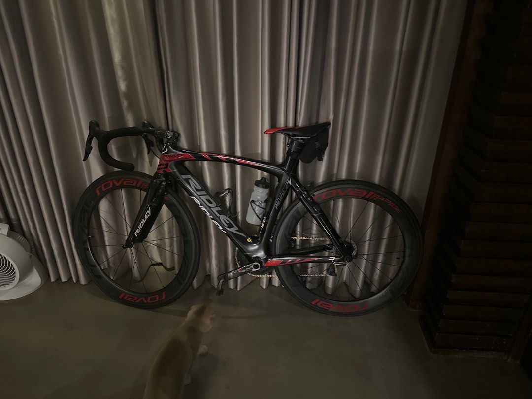Ridley Road Bike with Roval Wheels (Category: Bicycles) located in Manila. Submitted by knlud (Listing ID 1414950206, Image 1). Description: Black and red Ridley road bike with Roval wheels. Features drop handlebars, a water bottle cage, and a saddle bag. Includes a water bottle. NEGOTIABLE..