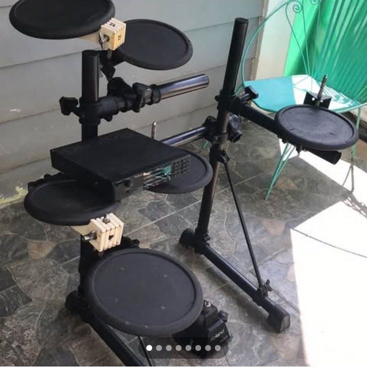 Roland TD-5 Electronic Drum Kit (Category: Musical Instruments) located in Manila. Submitted by beng1964 (Listing ID 1415033968, Image 1). Description: - Roland TD-5 electronic drum kit - Includes drum pads, sound module, and foot pedal - Sound module with drum sounds and effects controls - Fully functional and ready to play - Ideal for practice or performance.