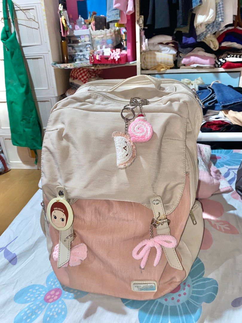 Ruffles Pink & Cream Backpack (big) (Category: Backpacks) located in Manila. Submitted by dearjahrnal (Listing ID 1414946572, Image 1). Description: original price : 1,5k. pins & keychains are not included, but will include freebies to buyer. zippers are working, obvious signs of usage, just need wash. still good. .