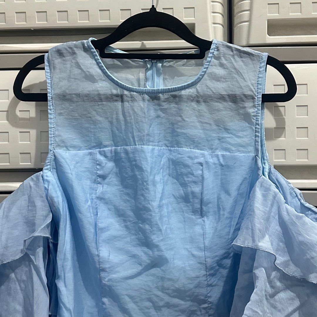 SHEIN Cold Shoulder Ruffle Top (Category: Blouses) located in Quezon City. Submitted by qcprlvd (Listing ID 1414836630, Image 3). Description: - washed, never been used.