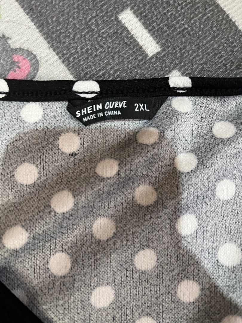 Shein Curve Polka Dot Blouse 2XL (Category: Blouses) located in Las Pinas. Submitted by fechai (Listing ID 1414857533, Image 3). Description: - Shein Curve blouse - Black and white polka dot pattern - Size: 2XL - Features a V-neck - Long sleeves - Made in China.
