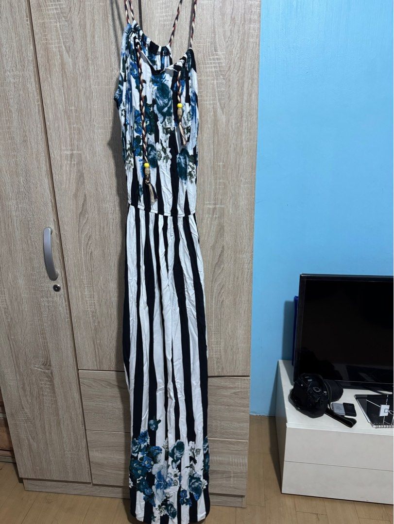 Striped Floral Maxi Dress (Category: Dresses) located in Caloocan City. Submitted by daybysunlight (Listing ID 1414927993, Image 1). Description: ♡ worn once ♡ size: fits s-m frames ♡ bought in a shop in nuvali several years ago ♡ black and white striped maxi dress ♡ floral design on the top with blue and white flowers ♡ thin straps ♡ elastic waist ♡ lightweight fabric ♡ floor-length hemline.
