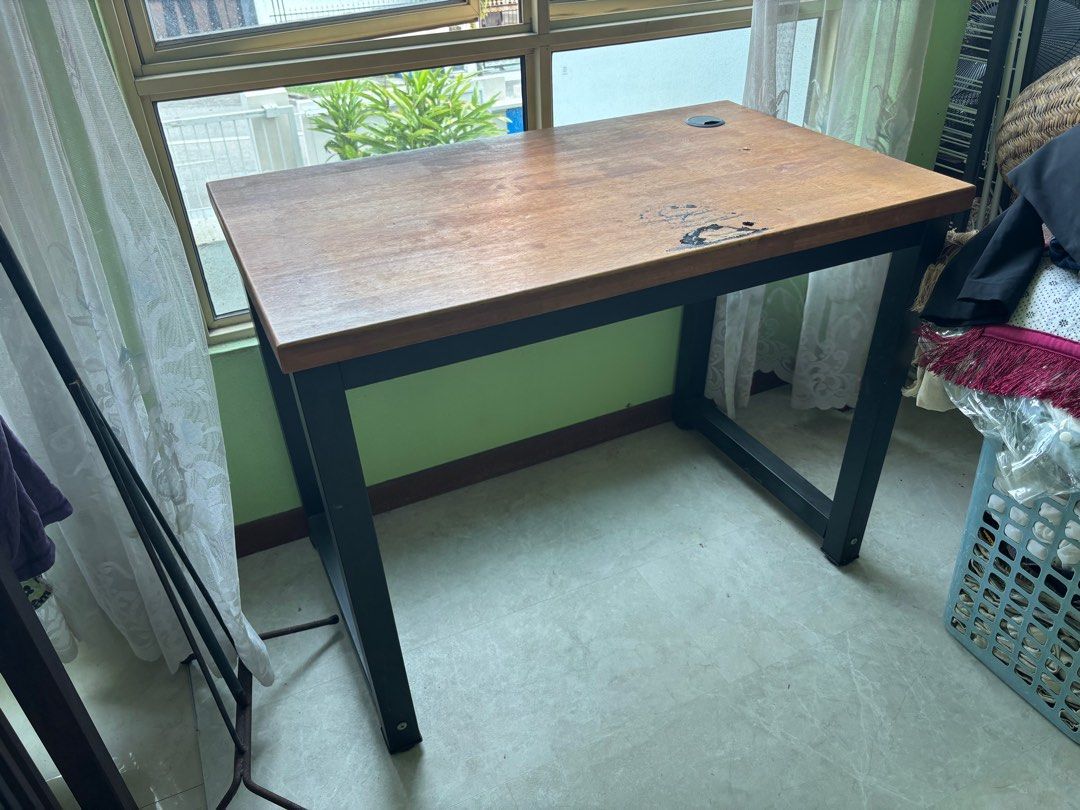 Study table (Category: Tables & Sets) located in Singapore. Submitted by anygoes (Listing ID 1414900525, Image 1). Description: - study table - Perfect for small spaces or as a decorative item - discolouration at the top, need to sand and varnish L x W x H 100 x 60 x 75 (cm).