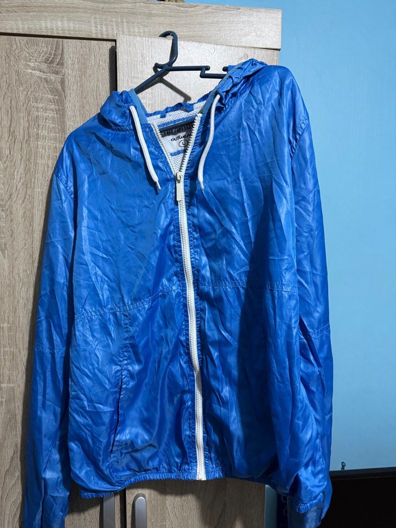 Terranova Blue Windbreaker Jacket (Category: Coats, Jackets and Outerwear) located in Caloocan City. Submitted by daybysunlight (Listing ID 1414930015, Image 1). Description: ♡ vibrant blue color ♡ size: L ♡ full-zipper closure ♡ includes a hood with white drawstrings ♡ two front pockets ♡ lightweight material.