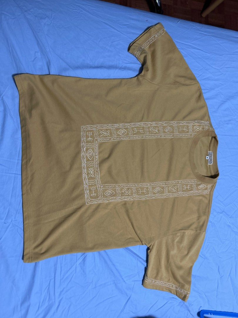 Tesoro's Embroidered T-Shirt - Medium (Category: Tshirts & Polo Shirts ) located in Mandaluyong City. Submitted by euni.san (Listing ID 1415017815, Image 2). Description: - Tesoro's T-shirt - Size: Medium - Color: Mustard - Design: White embroidery on front and sleeves - Style: Crew neck, short sleeves, boxy style - FINAL PRICE. Shipping fee already included if within metro manila - Payment via gcash or bpi only - RFS: extra unused gifts supposed