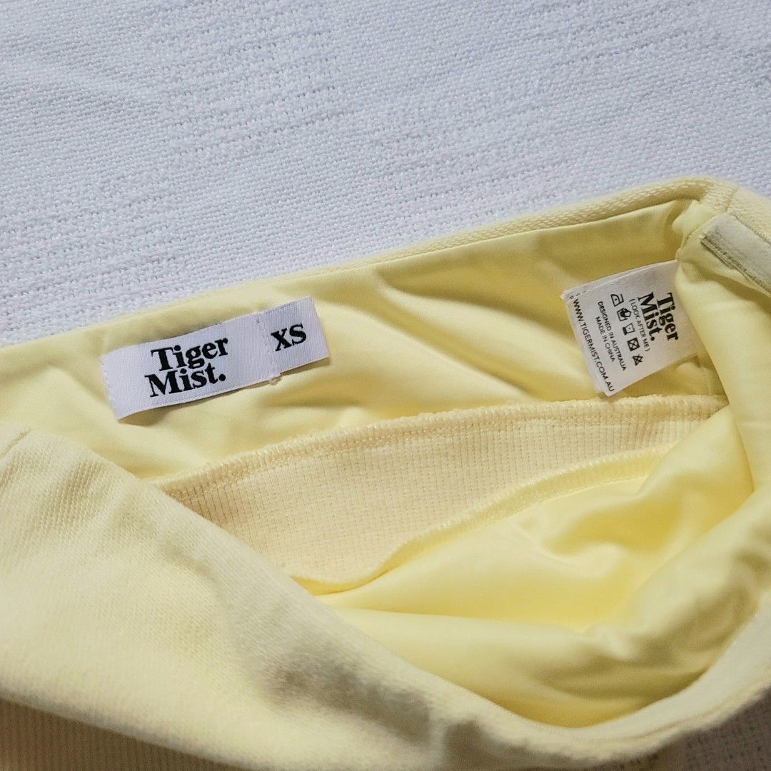 Tiger Mist yellow tube top (Category: Sleeveless) located in Rizal. Submitted by urkoala (Listing ID 1414874285, Image 2). Description: - fits xs to s - non slip Mine 250 Steal 299 .