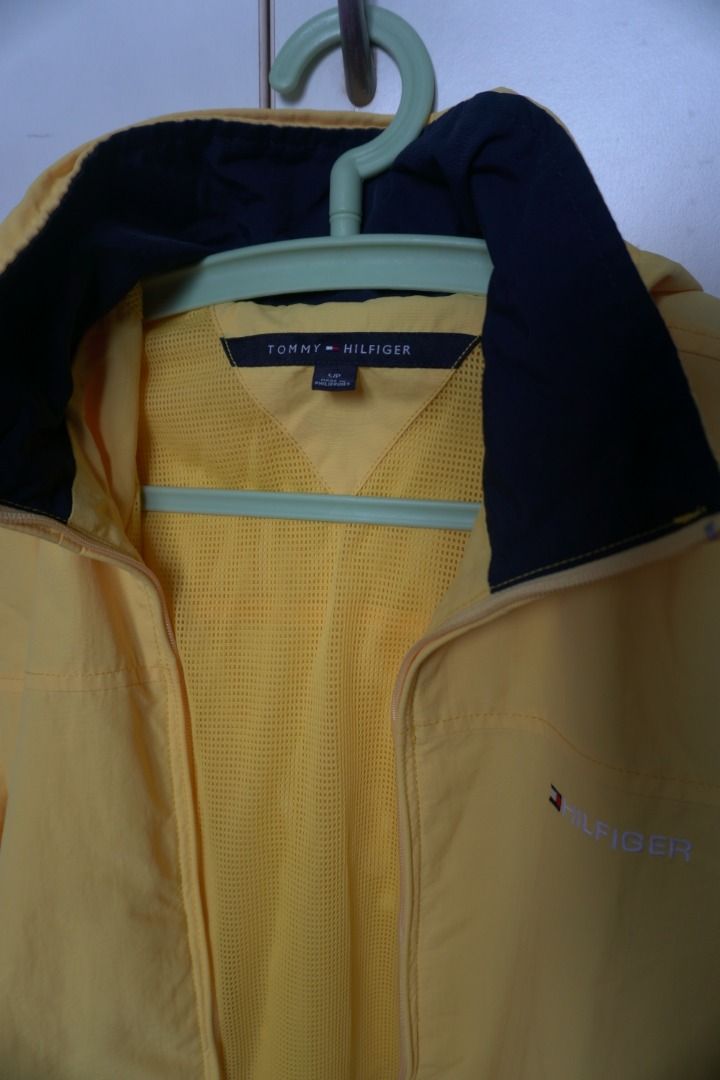 Tommy Hilfiger Yellow Yacht Jacket (Category: Coats, Jackets and Outerwear) located in Manila. Submitted by justanotherconsumer (Listing ID 1414912281, Image 3). Description: Tommy Hilfiger Yacht Jacket With Packable Hood - Yellow - Size: Small - Condition: Like New (9.5+/10) - No issues - Dimensions: 21x26 (inches) Can do meetups around Welcome Rotonda or Lalamove if via delivery around Metro Manila, buyer shoulders sf. DM!.