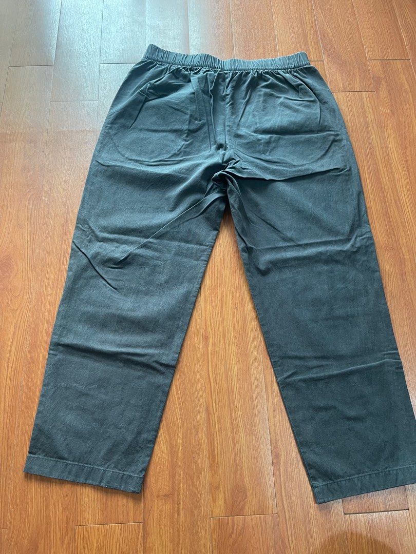 Uniqlo Cotton Pants - Size L (Category: Other Bottoms) located in Paranaque City. Submitted by melvinmarquez (Listing ID 1414876915, Image 1). Description: - Uniqlo cotton pants - Size: L - Color: Dark Grey - Features: Elastic waistband with drawstring - Material: 100% Cotton - Inseam: Approximately 28 inches - Leg Opening: Approximately 7 inches.