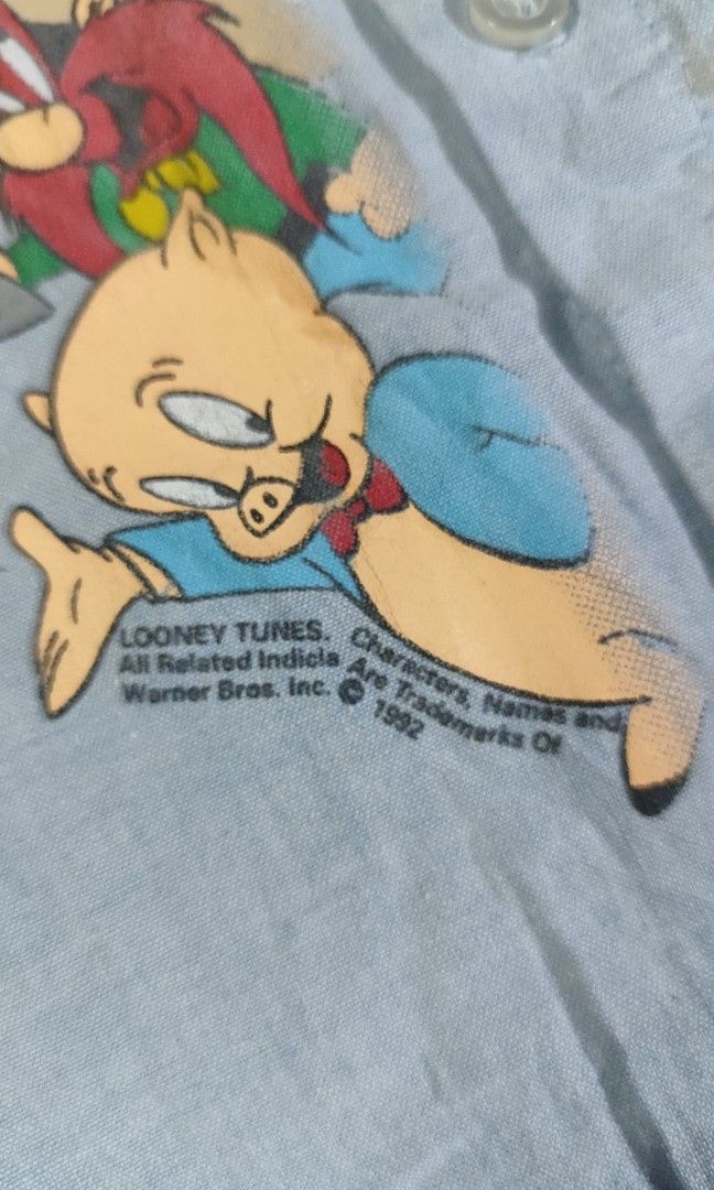 VINTAGE 1992 LOONEY TUNES BUTTON DOWN POLO (Category: Tshirts & Polo Shirts ) located in Manila. Submitted by rumarabe (Listing ID 1414985235, Image 2). Description: 1992 LOONEY TUNES BUTTON DOWN POLO COMPLETE TAGS SIZE: LARGE ON TAG(21X28) IN VERY GOOD CONDITION PA.
