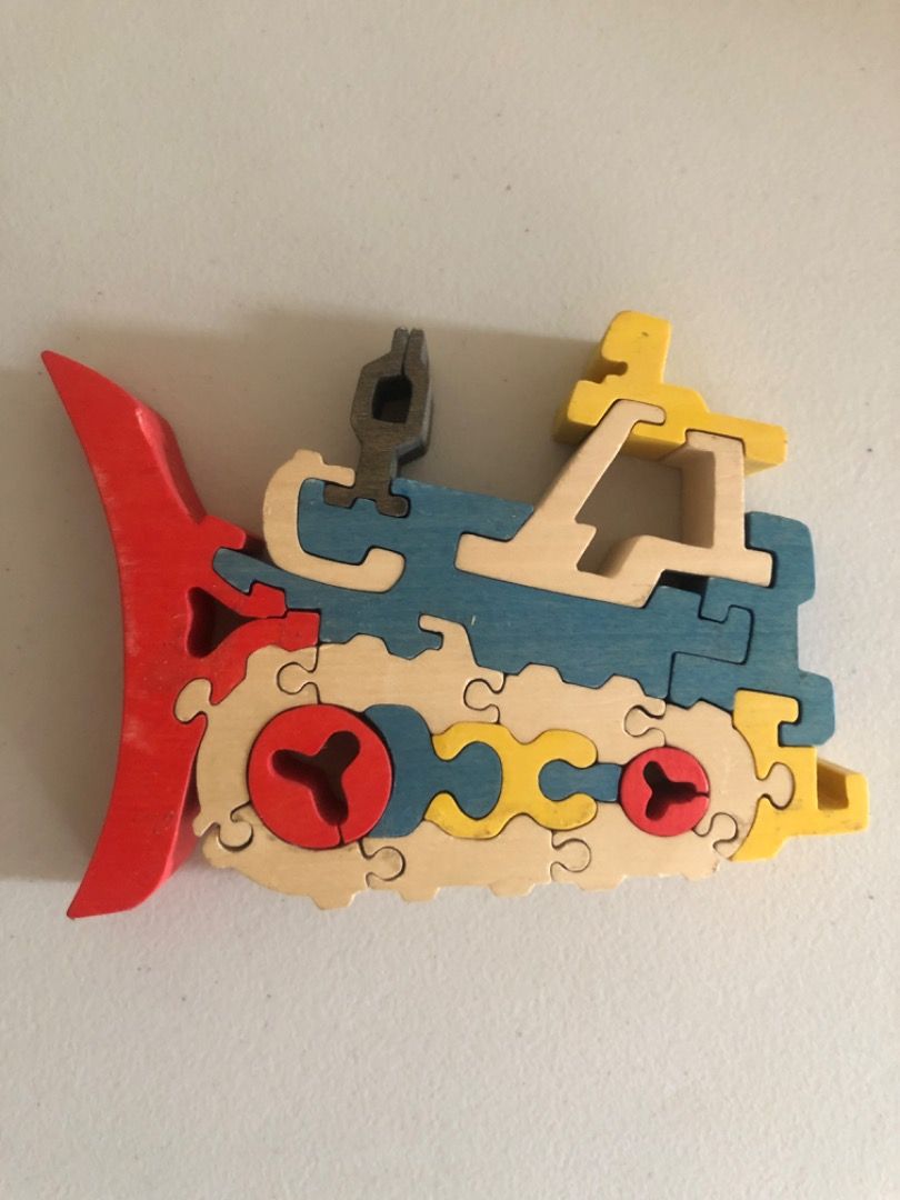 Wooden Bulldozer Puzzle (Category: Educational & Learning Toys) located in Imus. Submitted by dyelinn (Listing ID 1414843738, Image 1). Description: ✨PRELOVED 🇬🇧 Wooden Bulldozer Puzzle 📝 EUC; 20 pcs ⚠️ small piece choking hazard 300.