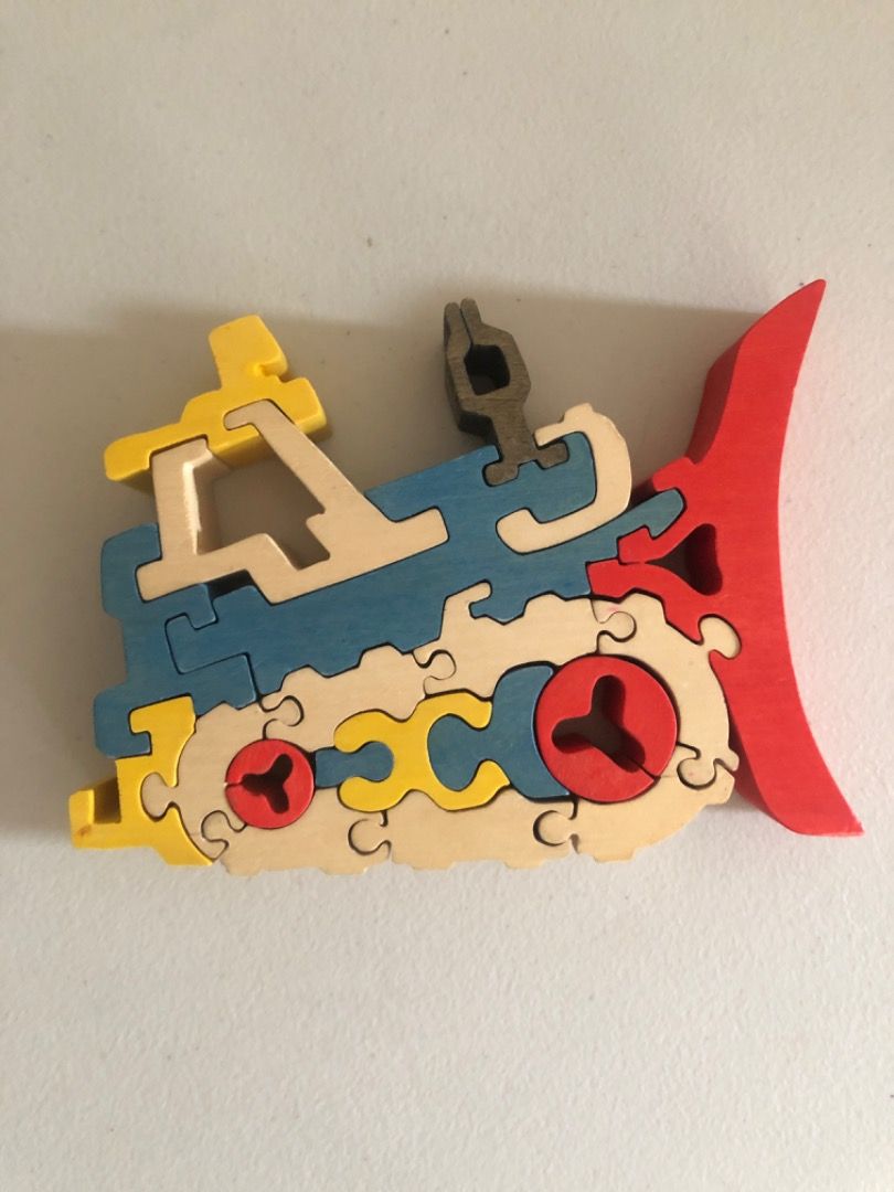 Wooden Bulldozer Puzzle (Category: Educational & Learning Toys) located in Imus. Submitted by dyelinn (Listing ID 1414843738, Image 3). Description: ✨PRELOVED 🇬🇧 Wooden Bulldozer Puzzle 📝 EUC; 20 pcs ⚠️ small piece choking hazard 300.