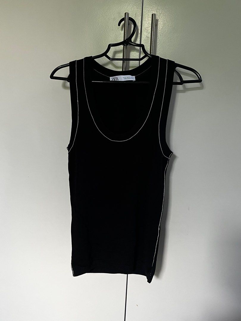 Zara Black Tank Top with White Stitching (Category: Sleeveless) located in Marikina City. Submitted by x08__31x (Listing ID 1414897605, Image 1). Description: - Zara black tank top - White stitching detail - Scoop neck - Sleeveless - Ribbed knit fabric - Tag visible.