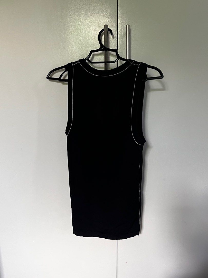 Zara Black Tank Top with White Stitching (Category: Sleeveless) located in Marikina City. Submitted by x08__31x (Listing ID 1414897605, Image 2). Description: - Zara black tank top - White stitching detail - Scoop neck - Sleeveless - Ribbed knit fabric - Tag visible.