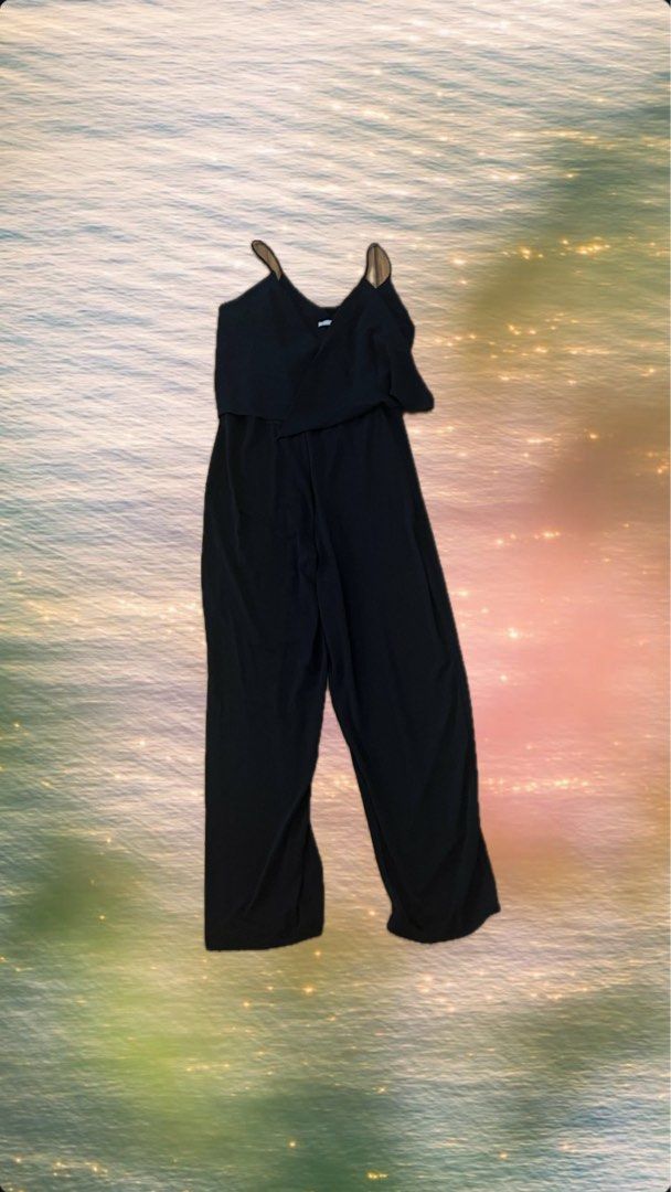 ZARA Black V-Neck Overlay Jumpsuit (Category: Jumpsuits) located in Manila. Submitted by soukcasa (Listing ID 1414903280, Image 2). Description: Size👚: M Brand🛒: Zara Conditon🛍️: Never worn RFS👜: Doesn’t fit A versatile wardrobe staple for any occasion. This black jumpsuit features delicate spaghetti straps and a flattering V-neckline with a tiered ruffle overlay on the bodice. DM me for inquiry!.