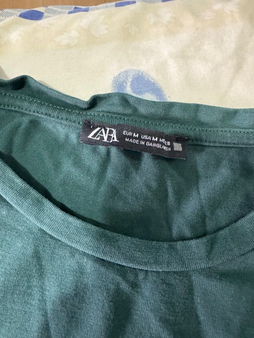 Zara Green T-shirt - Size M (Category: Shirts) located in Caloocan City. Submitted by daybysunlight (Listing ID 1414897244, Image 2). Description: ♡ solid green color ♡ crew neck ♡ size: EUR M / USA M / MEX 28 ♡ made in bangladesh ♡ comfortable fabric ♡ does not fit me anymore.