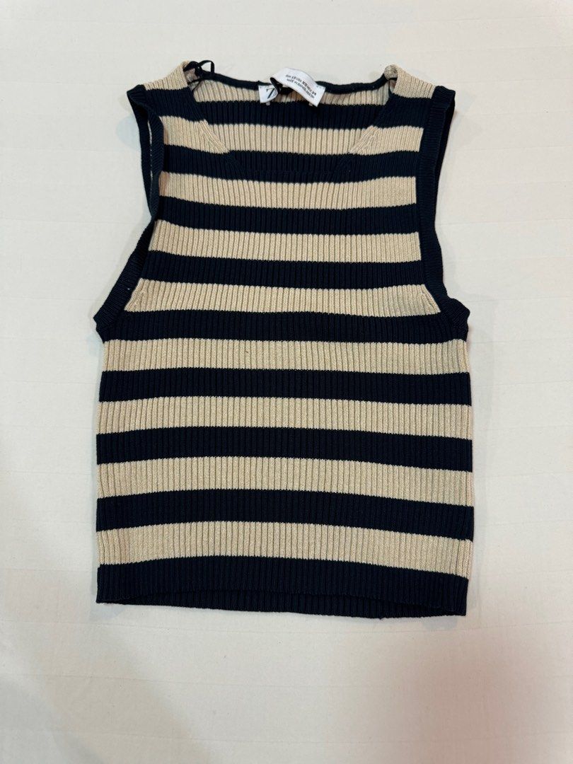 Zara Striped Sleeveless Top XS (Category: Sleeveless) located in Manila. Submitted by audsy (Listing ID 1414965464, Image 1). Description: - Zara sleeveless top - Striped design - Navy and beige color - Ribbed knit texture - Round neckline - Size: XS.