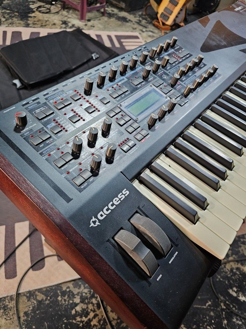 Access Virus TI 61 keyboard synthesizer (Category: Musical Instruments) located in Cebu City. Submitted by anthonyfeliciano (Listing ID 1415167850, Image 3). Description: power cable customized gig bag.