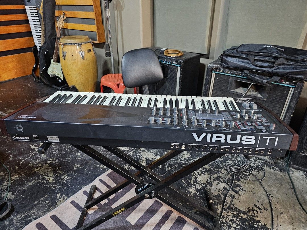 Access Virus TI 61 keyboard synthesizer (Category: Musical Instruments) located in Cebu City. Submitted by anthonyfeliciano (Listing ID 1415167850, Image 1). Description: power cable customized gig bag.