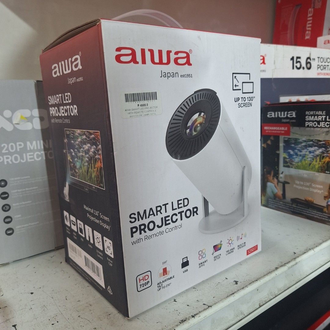 Aiwa Smart LED Projector (Category: Projectors) located in Muntinlupa City. Submitted by shopandsaveau (Listing ID 1415110337, Image 1). Description: Aiwa Smart LED Projector Surplus from Australia 720P HD Adjustable Tilt up to 120° USB Smart Apps Quick Setup 150 ANSI Lumens Built in Speaker Up to 130" Screen Compatible with Multiple Applications Connectivity: WiFi, HDMI, USB, Headphone Out.