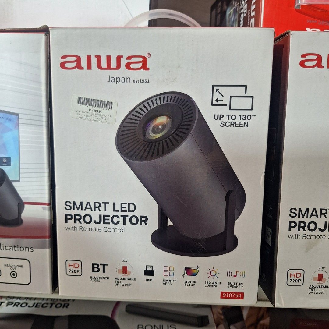 Aiwa Smart LED Projector (Category: Projectors) located in Muntinlupa City. Submitted by shopandsaveau (Listing ID 1415110337, Image 2). Description: Aiwa Smart LED Projector Surplus from Australia 720P HD Adjustable Tilt up to 120° USB Smart Apps Quick Setup 150 ANSI Lumens Built in Speaker Up to 130" Screen Compatible with Multiple Applications Connectivity: WiFi, HDMI, USB, Headphone Out.