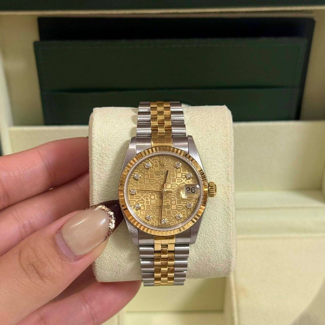 Authentic Rolex Datejust 31mm Anniversary Diamond Dial✨ (Category: Luxury Watches) located in Quezon City. Submitted by jhaediah (Listing ID 1415151898, Image 1). Description: ✨R Datejust 31mm Anniversary Diamond Dial✨ * Ref. No. 78273 * Anniversary Dial w/ Dias in 18k Yellow Gold Fluted Bezel on Jubilee Bracelet * Year 2001 * 9.5/10 condition * Inclusions: Watch and authentication from R&R.