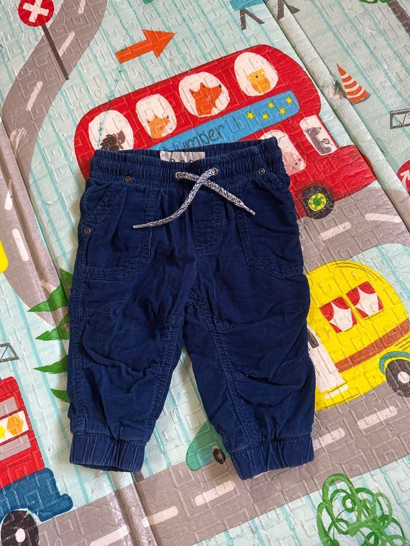 Baby Boy Corduroy Pants (Category: Babies & Kids Fashion) located in Baguio. Submitted by ailaysabel (Listing ID 1415128802, Image 1). Description: - Navy blue corduroy pants for baby boy - Elastic waistband with drawstring - Two front pockets - Gathered cuffs - Made of soft corduroy - Perfect for everyday wear.
