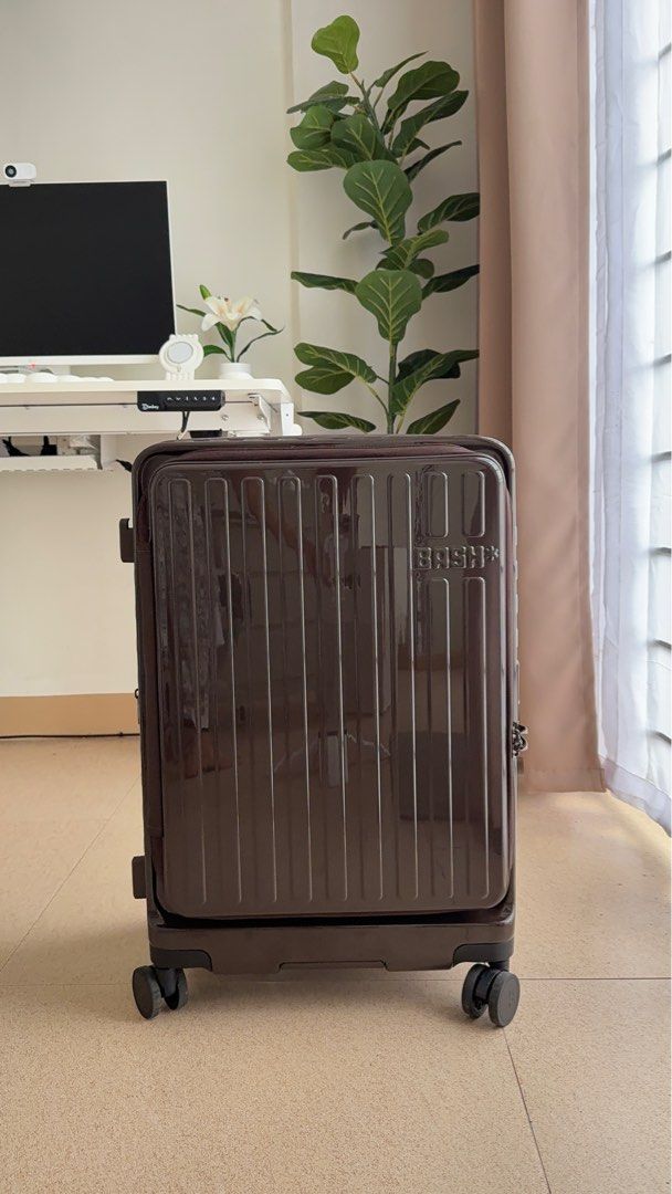BASH Medium Luggage + BASH Luggage Cover (Category: Luggage) located in Basud. Submitted by declutterhour (Listing ID 1415137925, Image 1). Description: BASH MNL LUGGAGE in Terra + BASH MNL LUGGAGE COVER in Slate + FREE Island Elephant Luggage Cover ✅ RFS: Will Buy Bigger Size ✅ Used only once in Hong Kong ✅ Like New ✅ You can ask for more video just message me - Stylish brown BASH luggage - Sleek, modern design - Durable exterior with vertical r