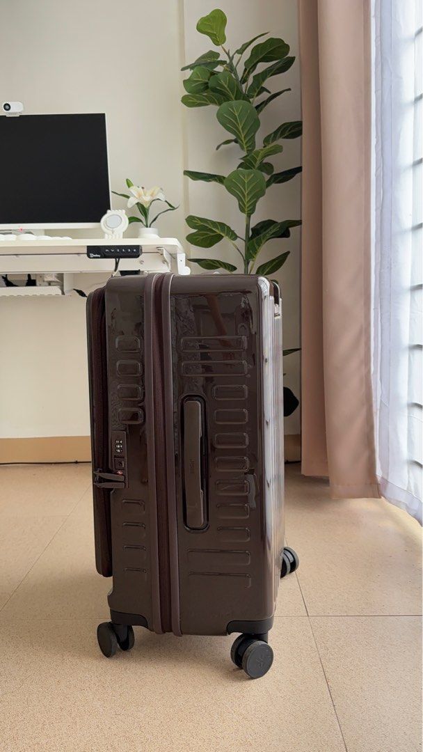 BASH Medium Luggage + BASH Luggage Cover (Category: Luggage) located in Basud. Submitted by declutterhour (Listing ID 1415137925, Image 3). Description: BASH MNL LUGGAGE in Terra + BASH MNL LUGGAGE COVER in Slate + FREE Island Elephant Luggage Cover ✅ RFS: Will Buy Bigger Size ✅ Used only once in Hong Kong ✅ Like New ✅ You can ask for more video just message me - Stylish brown BASH luggage - Sleek, modern design - Durable exterior with vertical r