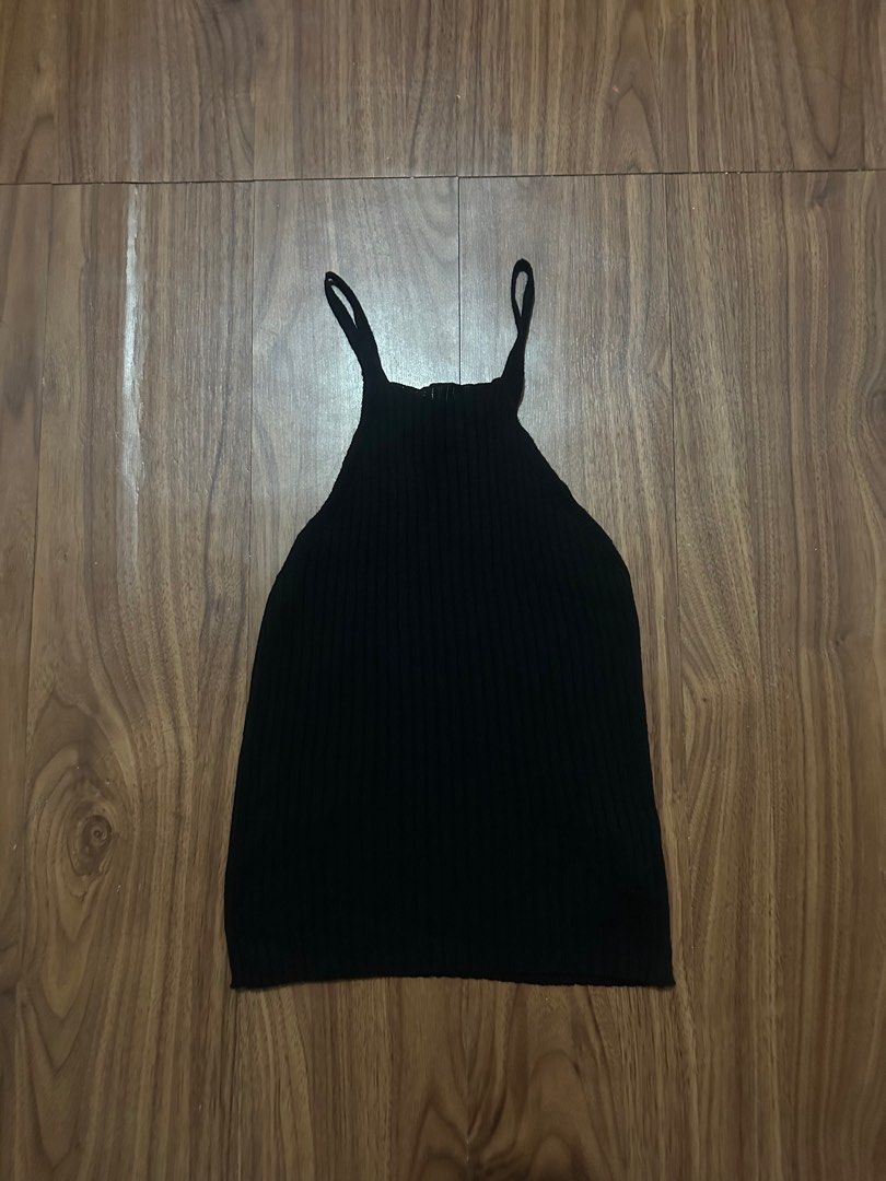 Trendyol Black Ribbed Tank Top (Category: Sleeveless) located in Bacoor. Submitted by nothanamiii (Listing ID 1415207715, Image 1). Description: - Black ribbed tank top - Halter neckline - Thin straps - Fitted silhouette - Stretchy material - Dress up or down.