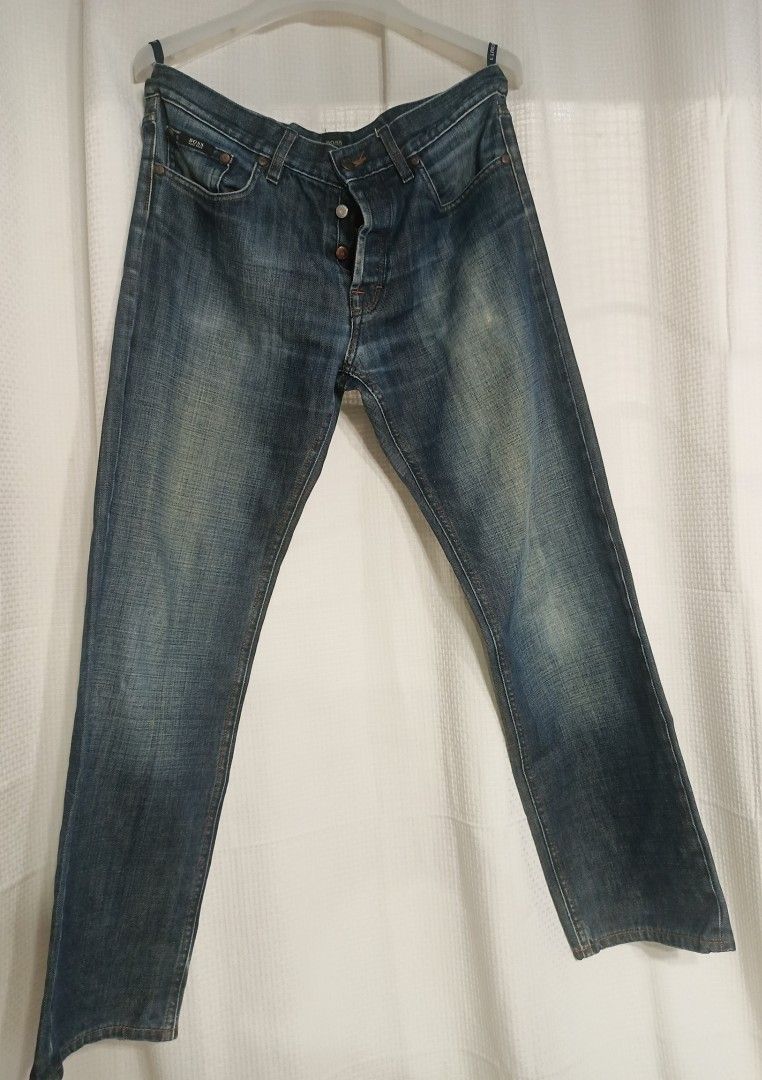 BOSS Hugo Boss Jeans (Category: Jeans) located in Cavite. Submitted by ag_closet (Listing ID 1415049102, Image 1). Description: - BOSS Hugo Boss jeans - Dark wash - Button fly - Classic five-pocket design - Regular fit - Leather BOSS logo patch - Came from UAE PM for more details! ✨.